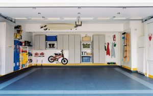 Upscale garage renovation with Surfboar bicycles in empty garage